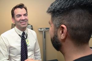 A doctor talking with a patient 